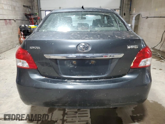 2009 Toyota Yaris z VIN JTDBT903391318992, wystawiony jako Copart lot #58753615 z przebiegiem 286 924 mil mil oraz Tytuł czysty. Historia ofert i sprzedaży dostępna na DreamBid. Obrazek 6.