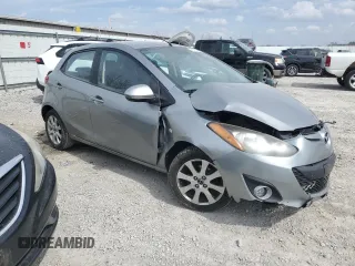 2014 Mazda 2 Touring z VIN JM1DE1LY5E0176964, wystawiony jako Copart lot #48875405 z przebiegiem 128 264 mil mil oraz Szkoda całkowita • Salvage title. Historia ofert i sprzedaży dostępna na DreamBid. Obrazek 4.
