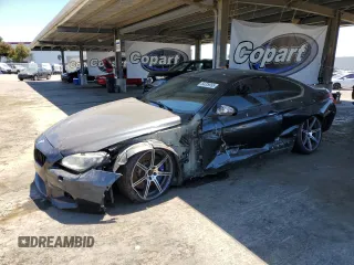 2014 BMW M6 с VIN WBSLX9C52ED160538, выставлен на аукционе Copart как лот 64329095 с пробегом Не указан миль и Списание • Salvage title. История ставок и продаж доступна на DreamBid. Изображение 1.