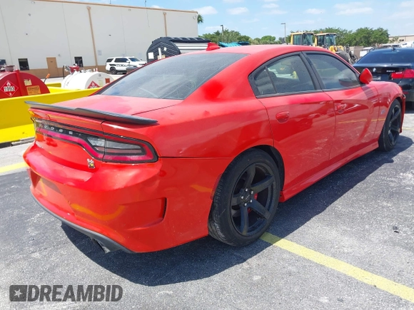 2020 Dodge Charger Scat Pack z VIN 2C3CDXGJ6LH197320, wystawiony jako IAAI lot #42158001 z przebiegiem 27 912 mil mil oraz . Historia ofert i sprzedaży dostępna na DreamBid. Obrazek 4.