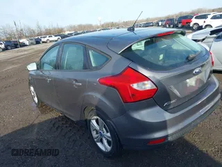 2013 Ford Focus SE with VIN 1FADP3K28DL112777, listed as a IAAI auction lot 41386940 with 107,893 mi miles. Bid and sale history available at carsss.com. Image 3.
