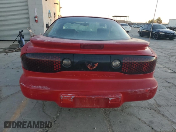 1998 Pontiac Firebird Firebird z VIN 2G2FS22K0W2201603, wystawiony jako Copart lot #79671704 z przebiegiem 309 203 mil mil oraz Czysty tytuł • Clean title. Historia ofert i sprzedaży dostępna na DreamBid. Obrazek 6.