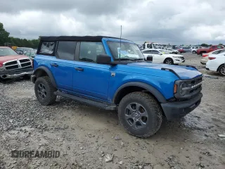 2021 Ford Bronco with VIN 1FMDE5BH9MLB02593, listed as a Copart auction lot 59632675 with 64,833 mi miles and Salvage title. Bid and sale history available at DreamBid. Image 4.