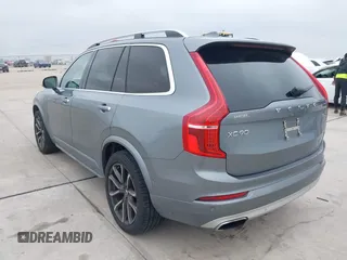 2016 Volvo XC90 T6 Momentum with VIN YV4A22PKXG1021392, listed as a IAAI auction lot 41413673 with 144,761 mi miles. Bid and sale history available at carsss.com. Image 3.