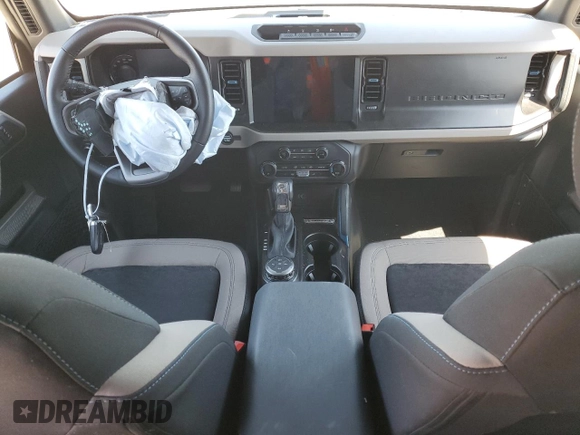 2023 Ford Bronco with VIN 1FMEE5DP6PLB66975, listed as a Copart auction lot 57536014 with 11,883 mi miles and Salvage Title. Bid and sale history available at DreamBid. Image 8.