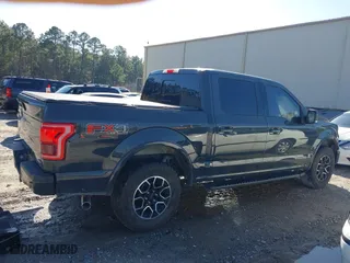 2016 Ford F-150 XLT with VIN 1FTEW1EF2GKE21353, listed as a IAAI auction lot 41209744 with 104,198 mi miles. Bid and sale history available at carsss.com. Image 14.