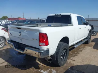 2015 Ram 2500 SLT with VIN 3C6UR5ML3FG674244, listed as a IAAI auction lot 42550144 with 220,481 mi miles and . Bid and sale history available at DreamBid. Image 4.
