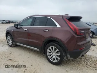 2023 Cadillac XT4 FWD Premium Luxury with VIN 1GYFZCR48PF100078, listed as a Copart auction lot 55955865 with 23,509 mi miles and Salvage title. Bid and sale history available at DreamBid. Image 2.