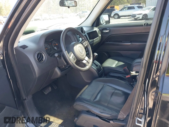 2014 Jeep Patriot High Altitude with VIN 1C4NJPFA8ED889299, listed as a IAAI auction lot 41735541 with 151,499 mi miles and . Bid and sale history available at DreamBid. Image 5.