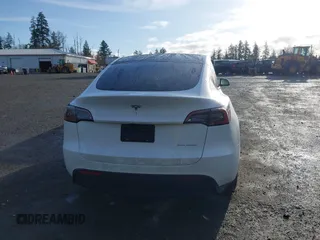 2024 Tesla Model Y Long Range with VIN 7SAYGDEE1RF056816, listed as a IAAI auction lot 41809125 with 6,434 mi miles and . Bid and sale history available at DreamBid. Image 17.