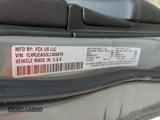 2020 Jeep Grand Cherokee Laredo E with VIN 1C4RJEAG0LC404979, listed as a Copart auction lot 81999474 with 57,328 mi miles and Salvage title. Bid and sale history available at DreamBid. Image 16.