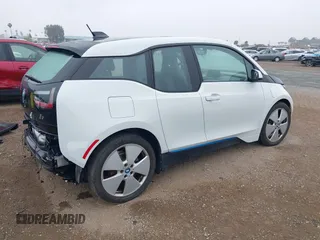 2014 BMW i3 с VIN WBY1Z4C51EV274325, выставлен на аукционе IAAI как лот 42412745 с пробегом 65 641 миль миль и . История ставок и продаж доступна на DreamBid. Изображение 4.
