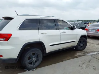 2012 Jeep Grand Cherokee Laredo with VIN 1C4RJFAG8CC124877, listed as a IAAI auction lot 41940603 with 254,356 mi miles. Bid and sale history available at carsss.com. Image 13.