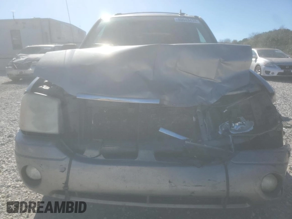 2006 GMC Envoy SLE with VIN 1GKDS13S662184697, listed as a Copart auction lot 80043434 with 196,077 mi miles and Salvage Title. Bid and sale history available at carsss.com. Image 5.
