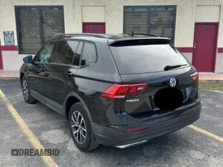 2021 Volkswagen Tiguan S with VIN 3VV1B7AX9MM105997, listed as a Copart auction lot 57079115 with 146,399 mi miles and Clean title. Bid and sale history available at DreamBid. Image 3.