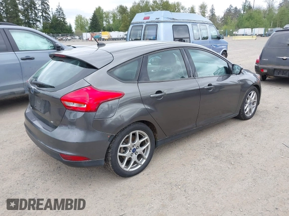2015 Ford Focus SE with VIN 1FADP3K26FL269811, listed as a IAAI auction lot 42148333 with 157,192 mi miles. Bid and sale history available at carsss.com. Image 4.
