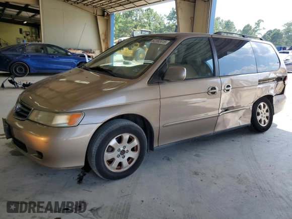 2003 Honda Odyssey EX-L with VIN 5FNRL18963B087397, listed as a Copart auction lot 62392415 with 261,737 mi miles and Salvage title. Bid and sale history available at DreamBid. Image 1.