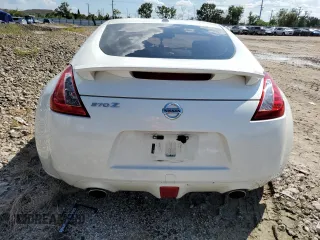 2014 Nissan 370Z Touring with VIN JN1AZ4EH0EM636520, listed as a Copart auction lot 73661434 with 0 mi miles and Salvage Title. Bid and sale history available at carsss.com. Image 6.