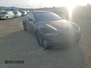 2017 Tesla Model S 100D with VIN 5YJSA1E27HF185487, listed as a Copart auction lot 47979455 with 184,987 mi miles and Salvage Title. Bid and sale history available at DreamBid. Image 10.