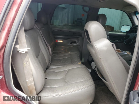 2003 Chevrolet Tahoe LS z VIN 1GNEC13T43J139403, wystawiony jako Copart lot #56891365 z przebiegiem Nie podano mil oraz Szkoda całkowita • Salvage title. Historia ofert i sprzedaży dostępna na DreamBid. Obrazek 10.
