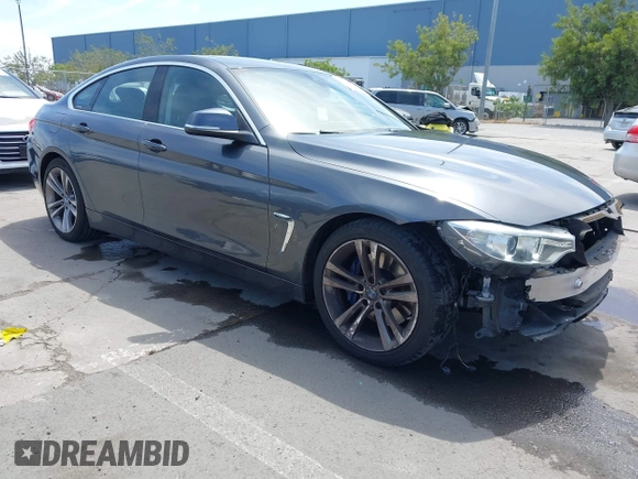 2015 BMW 4 Series 428i with VIN WBA4A5C59FGK15750, listed as a IAAI auction lot 42098856 with 62,530 mi miles and . Bid and sale history available at DreamBid. Image 1.