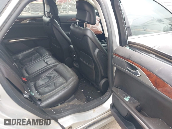2013 Lincoln MKZ z VIN 3LN6L2G90DR826978, wystawiony jako IAAI lot #40630089 z przebiegiem Nie podano mil oraz . Historia ofert i sprzedaży dostępna na DreamBid. Obrazek 8.