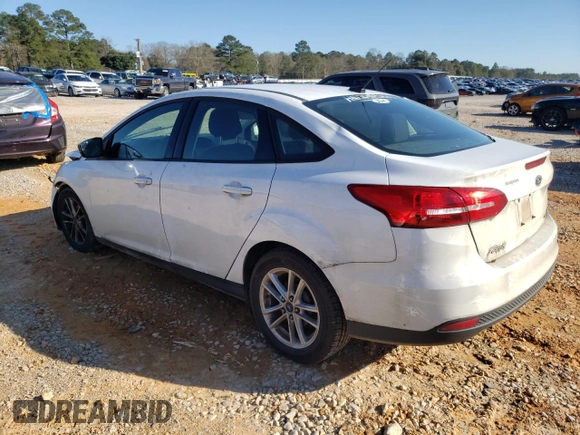2018 Ford Focus SE with VIN 1FADP3F23JL220312, listed as a Copart auction lot 46903995 with 128,549 mi miles and Salvage Title. Bid and sale history available at carsss.com. Image 2.