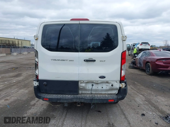 2019 Ford Transit Passenger XL z VIN 1FBZX2ZM7KKA47090, wystawiony jako IAAI lot #41823708 z przebiegiem 236 058 mil mil oraz . Historia ofert i sprzedaży dostępna na DreamBid. Obrazek 16.