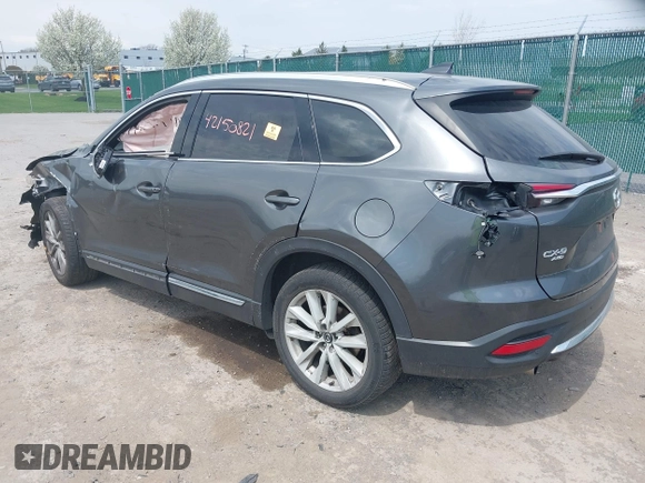 2016 Mazda CX-9 Grand Touring with VIN JM3TCBDY3G0117802, listed as a IAAI auction lot 42150821 with 157,760 mi miles and . Bid and sale history available at DreamBid. Image 3.