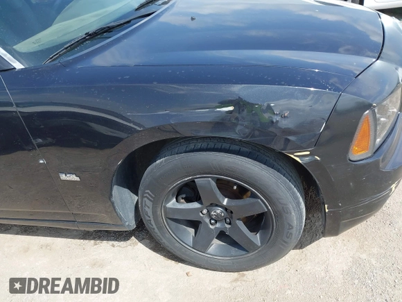 2007 Dodge Charger with VIN 2B3KA43G27H652874, listed as a IAAI auction lot 42030171 with 216,231 mi miles and . Bid and sale history available at DreamBid. Image 12.