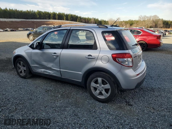 2010 Suzuki SX4 Touring with VIN JS2YB5A73A6300609, listed as a Copart auction lot 45541075 with 140,641 mi miles and Salvage Title. Bid and sale history available at carsss.com. Image 2.