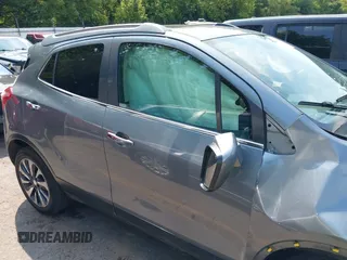 2019 Buick Encore Essence with VIN KL4CJGSM1KB890660, listed as a IAAI auction lot 40010798 with Not Provided miles and . Bid and sale history available at carsss.com. Image 13.