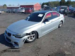 2012 BMW 3 Series 328i with VIN WBA3A5C55CFJ89595, listed as a IAAI auction lot 41926151 with 210,946 mi miles. Bid and sale history available at carsss.com. Image 2.