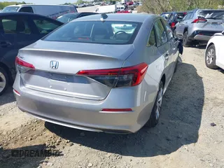 2024 Honda Civic LX z VIN 2HGFE2F25RH568111, wystawiony jako IAAI lot #41982920 z przebiegiem 20 286 mil mil oraz . Historia ofert i sprzedaży dostępna na DreamBid. Obrazek 4.