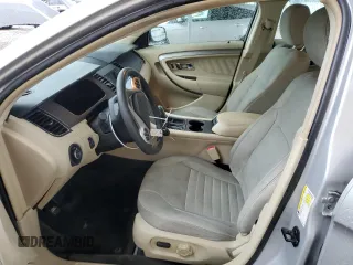 2014 Ford Taurus SE with VIN 1FAHP2D87EG164232, listed as a Copart auction lot 83407024 with 156,348 mi miles and Salvage Title. Bid and sale history available at DreamBid. Image 7.