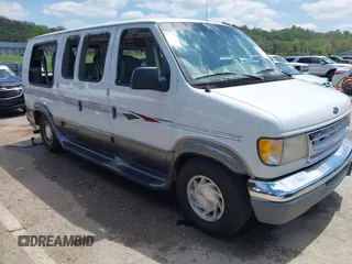 1999 Ford Econoline Cargo Recreational with VIN 1FDRE14L2XHA41059, listed as a IAAI auction lot 42067879 with 149,185 mi miles. Bid and sale history available at carsss.com. Image 1.