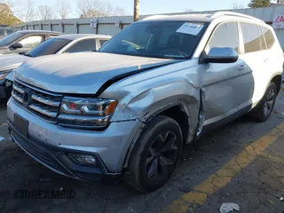 2018 Volkswagen Atlas SE with VIN 1V2CP2CA6JC595850, listed as a IAAI auction lot 41344485 with 86,469 mi miles and . Bid and sale history available at DreamBid. Image 16.