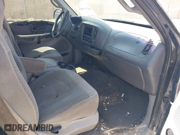 2001 Ford F-150 XL with VIN 1FTRX17L41NA08695, listed as a IAAI auction lot 42558909 with 267,203 mi miles and . Bid and sale history available at DreamBid. Image 5.