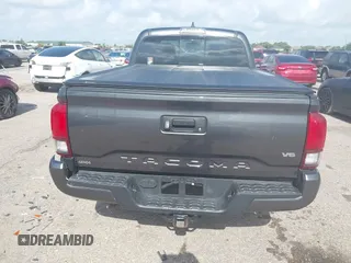 2018 Toyota Tacoma SR5 with VIN 3TMDZ5BN0JM051283, listed as a IAAI auction lot 42438690 with 106,155 mi miles and . Bid and sale history available at DreamBid. Image 16.