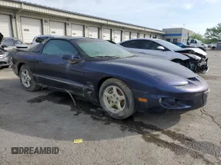 1999 Pontiac Firebird Firebird with VIN 2G2FS22K4X2202867, listed as a Copart auction lot 54529755 with Not provided miles and Salvage title. Bid and sale history available at DreamBid. Image 4.