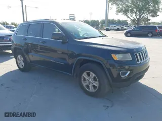 2014 Jeep Grand Cherokee Laredo with VIN 1C4RJEAG6EC136832, listed as a IAAI auction lot 42020647 with 151,639 mi miles. Bid and sale history available at carsss.com. Image 1.
