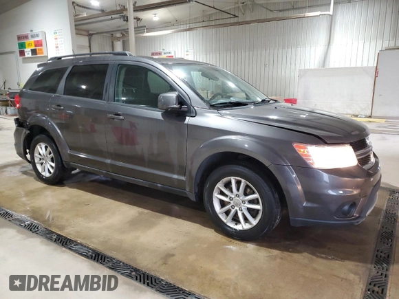 2016 Dodge Journey SXT with VIN 3C4PDDBG8GT242018, listed as a Copart auction lot 52899665 with 132,567 mi miles and Salvage Title. Bid and sale history available at DreamBid. Image 4.