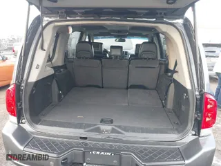 2015 Nissan Armada SV with VIN 5N1BA0ND5FN601574, listed as a IAAI auction lot 41240197 with 180,008 mi miles. Bid and sale history available at carsss.com. Image 8.