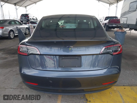 2020 Tesla Model 3 Standard Range Plus with VIN 5YJ3E1EA8LF743405, listed as a IAAI auction lot 41923592 with 81,901 mi miles. Bid and sale history available at carsss.com. Image 16.