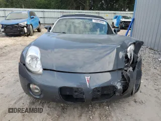 2009 Pontiac Solstice z VIN 1G2MN35B69Y105093, wystawiony jako Copart lot #72854034 z przebiegiem 82 333 mil mil oraz Szkoda całkowita • Salvage title. Historia ofert i sprzedaży dostępna na DreamBid. Obrazek 5.