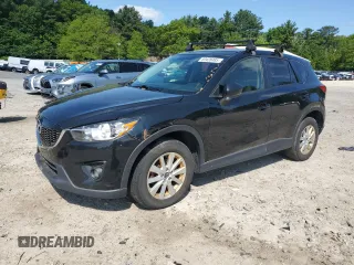 2014 Mazda CX-5 Touring z VIN JM3KE4CY3E0371767, wystawiony jako Copart lot #59428485 z przebiegiem 238 464 mil mil oraz Tytuł czysty. Historia ofert i sprzedaży dostępna na DreamBid. Obrazek 1.