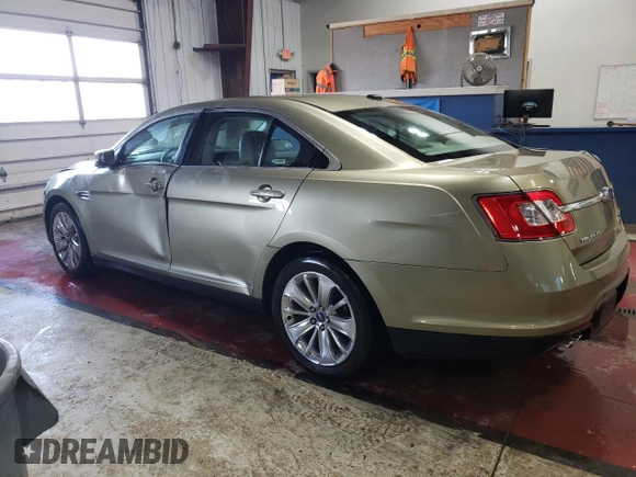 2012 Ford Taurus Limited with VIN 1FAHP2JW3CG142762, listed as a Copart auction lot 77864584 with 131,911 mi miles and Salvage title. Bid and sale history available at DreamBid. Image 2.