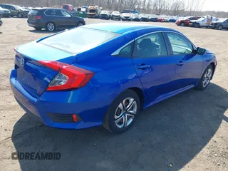 2017 Honda Civic LX z VIN 19XFC2F54HE203525, wystawiony jako IAAI lot #41796081 z przebiegiem 82 910 mil mil oraz . Historia ofert i sprzedaży dostępna na DreamBid. Obrazek 4.