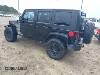 2008 Jeep Wrangler Unlimited Sahara with VIN 1J4GA59128L504798, listed as a IAAI auction lot 42210839 with 162,406 mi miles and . Bid and sale history available at DreamBid. Image 3.
