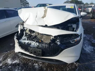 2020 Mazda 3 Preferred with VIN JM1BPBMM0L1157345, listed as a IAAI auction lot 41332440 with 64,730 mi miles and . Bid and sale history available at DreamBid. Image 12.